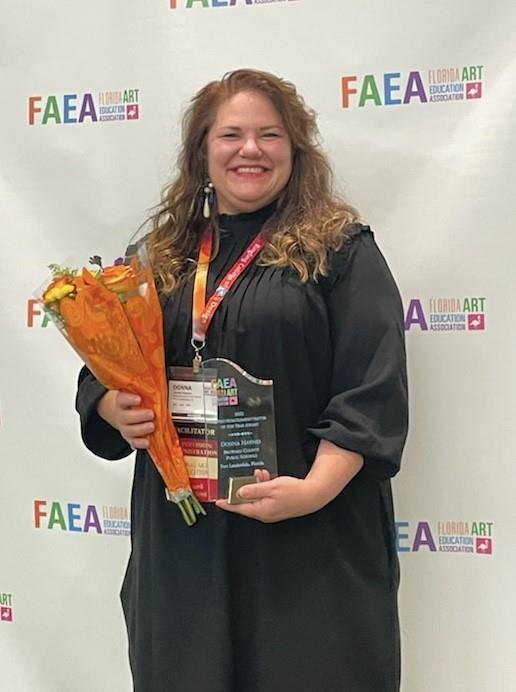 Donna Haynes BCPS Visual Arts Supervisor receiving the 2022 FAEA Arts Supervisor of the Year Award.